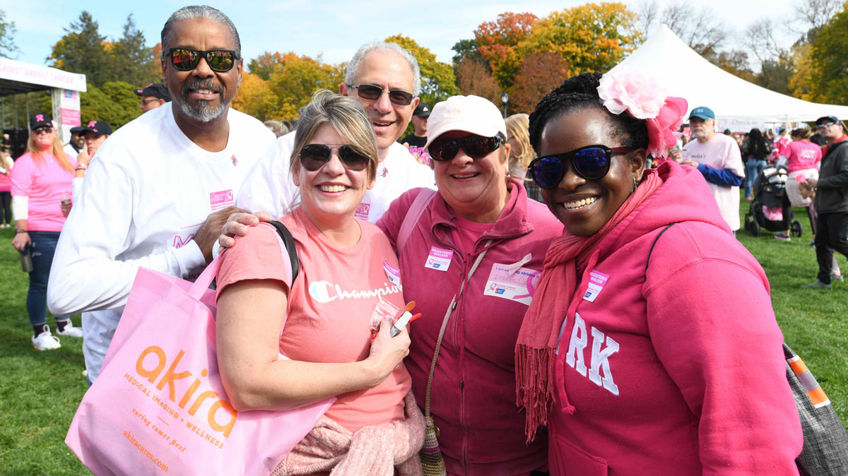 NYSUT Secretary-Treasurer J. Philippe Abraham and President Andy Pallotta, back row, join walkers at Albany’s Washington Park. Abraham leads NYSUT’s efforts with the annual walk against breast cancer.