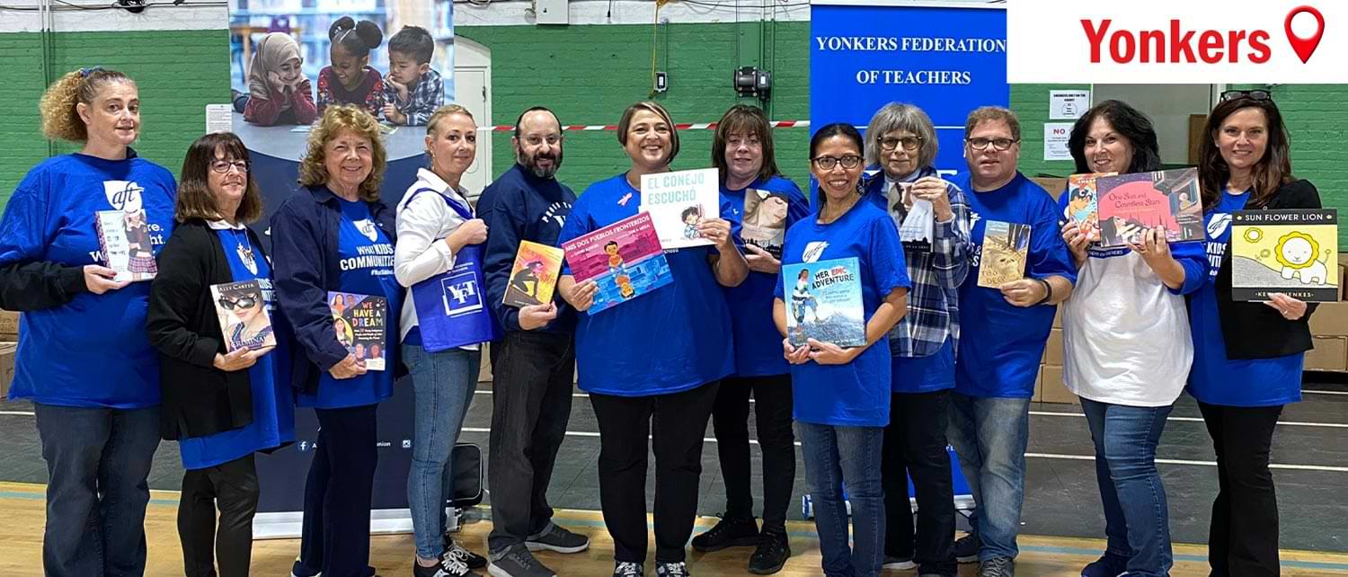 members of the Yonkers Federation of Teachers photographed holding books