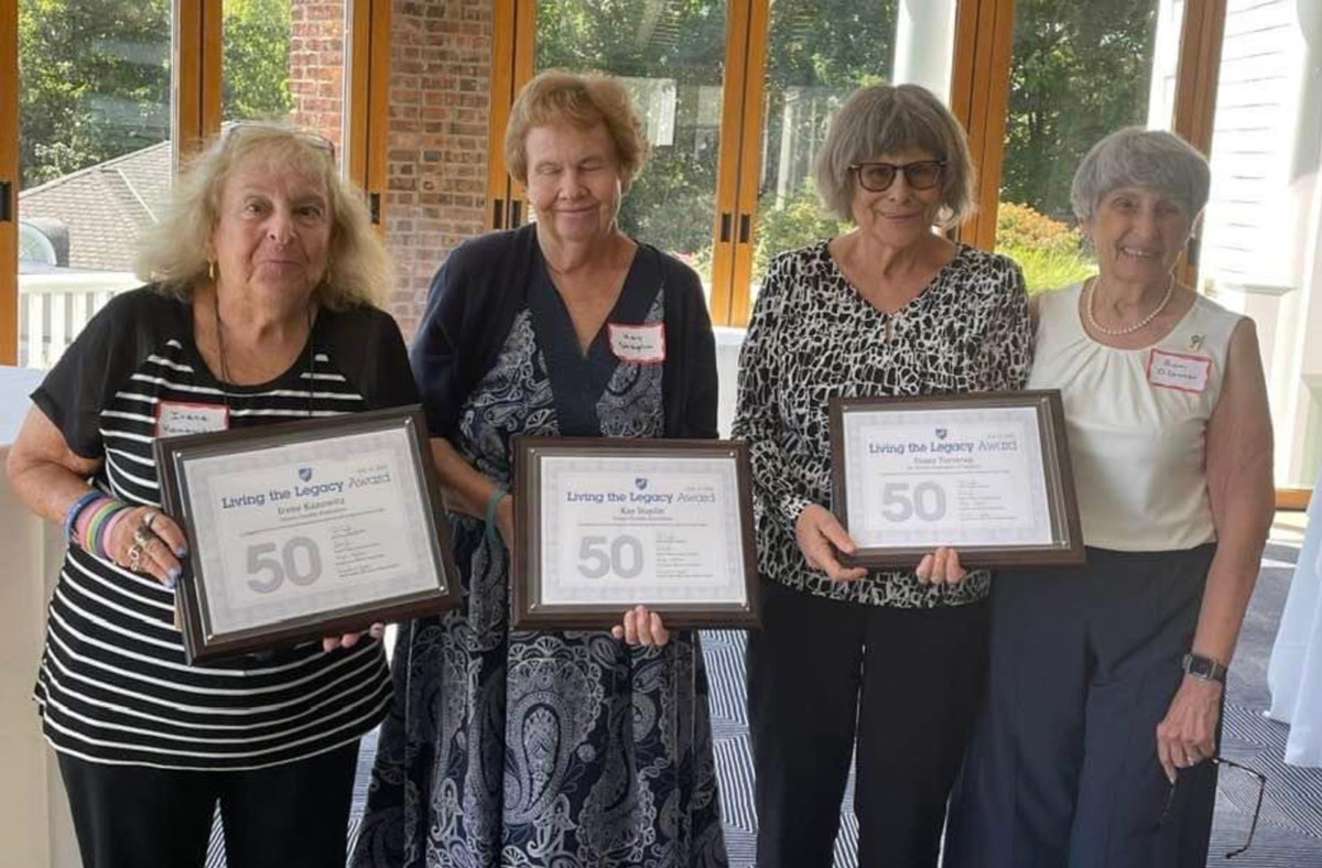 retiree council presenting Living the Legacy awards