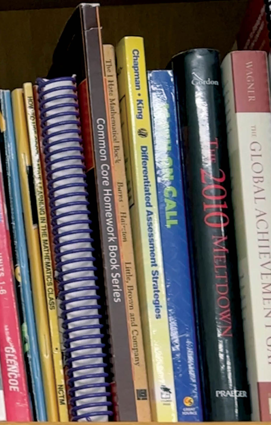 school textbooks on a shelf