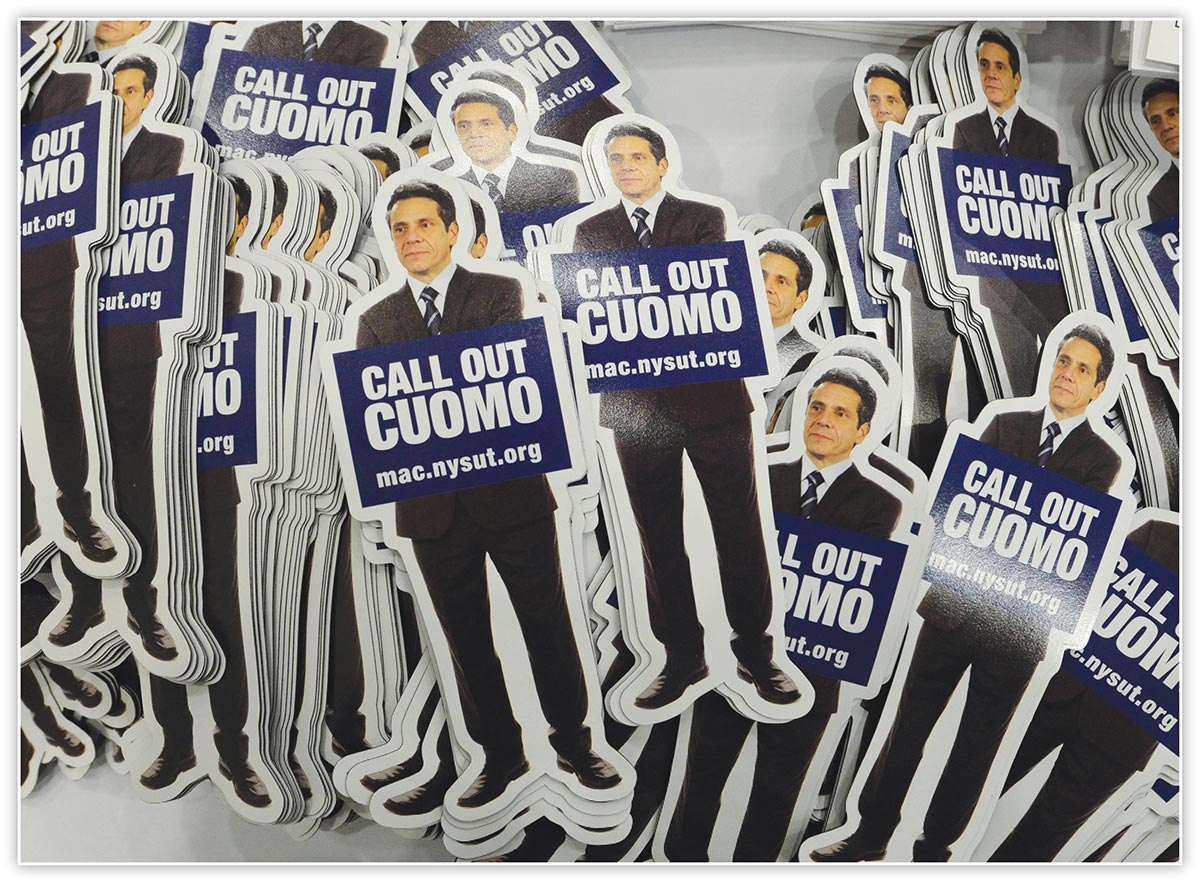 Pile of "Call Out Cuomo" magnets