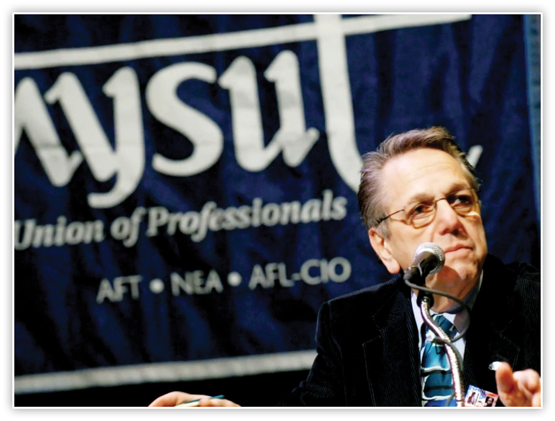 NYSUT Executive Vice President Emeritus Alan Lubin speaking at event