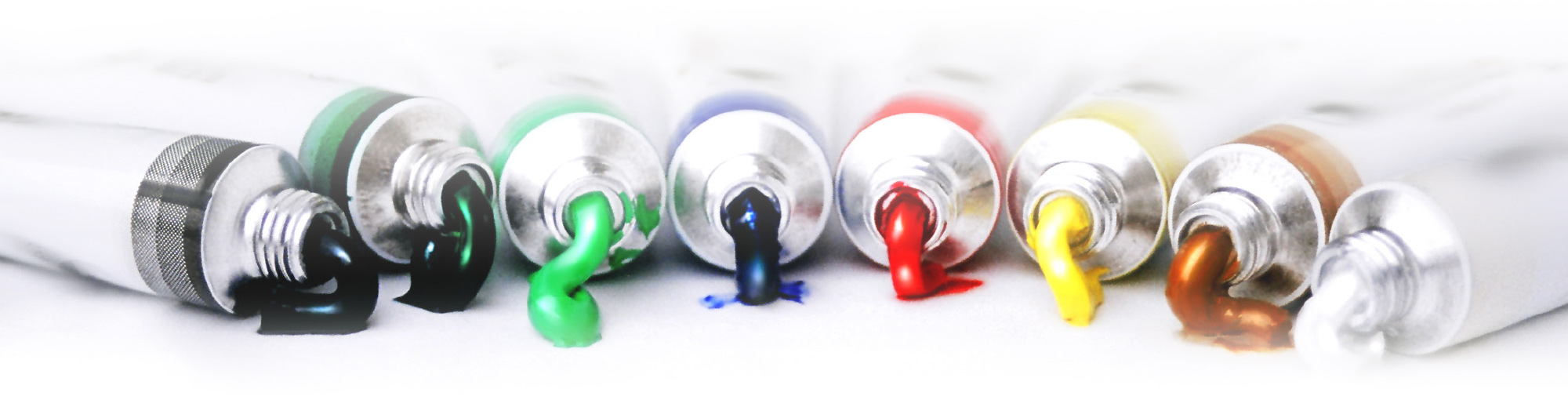 eight different colored tubes of paint