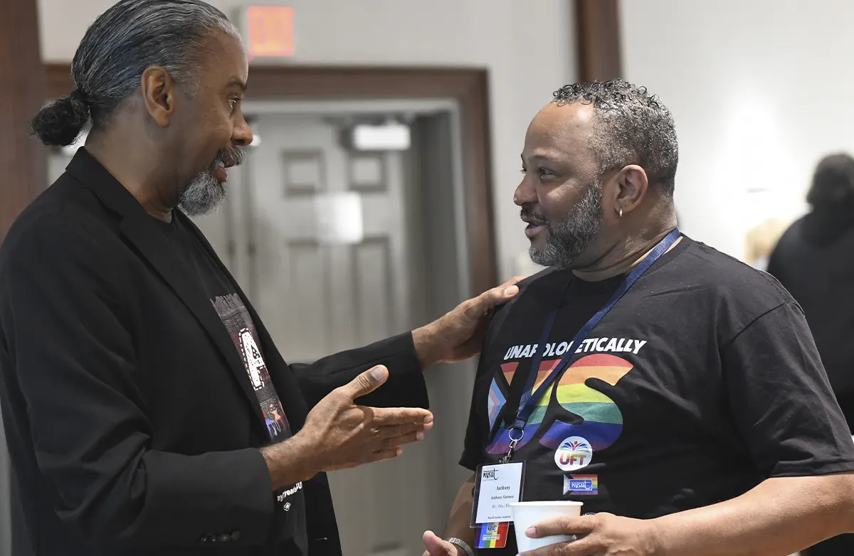 J. Philippe Abraham and Anthony Harmon chatting