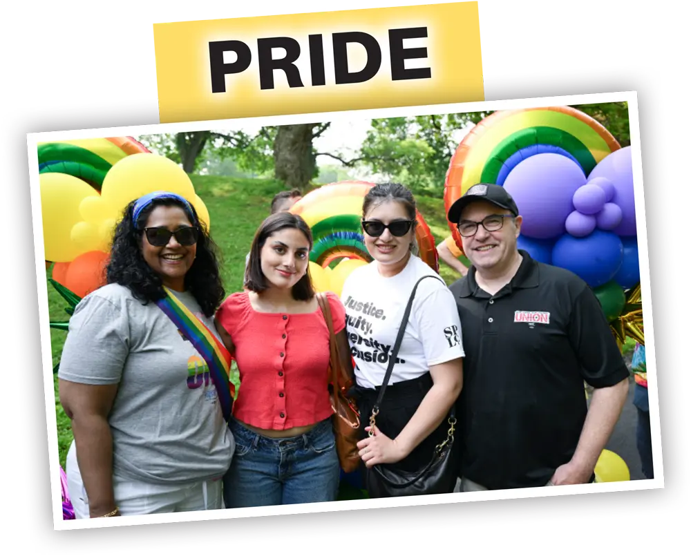 Pride typography; image of four people stand together outdoors with colorful balloons in the background.